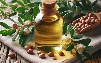 تصویر بطری روغن جوجوبا و دانه های قهوه مانند آن